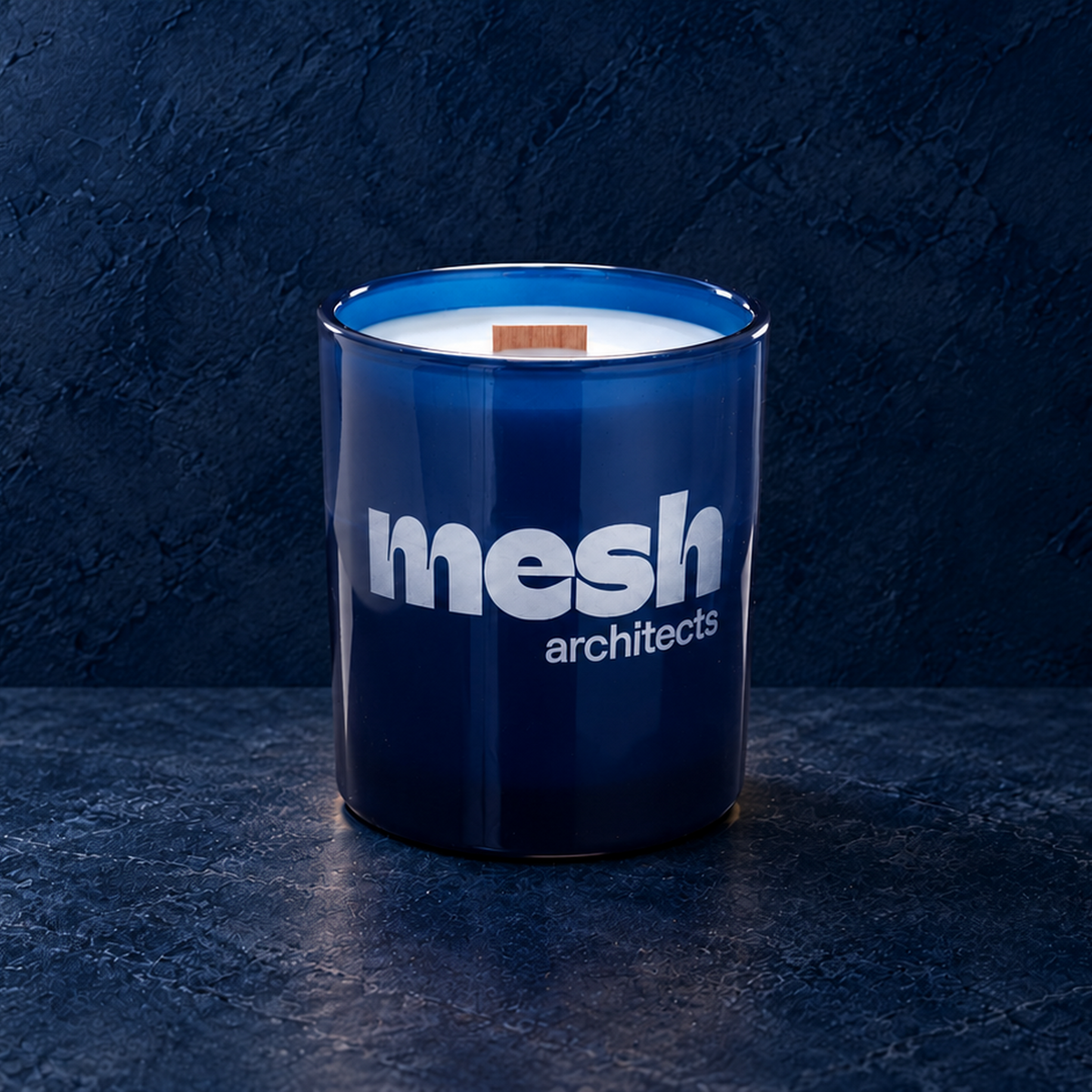 Blue 14 oz. Luxury Engraved Candle with a custom engraved logo, unlit.