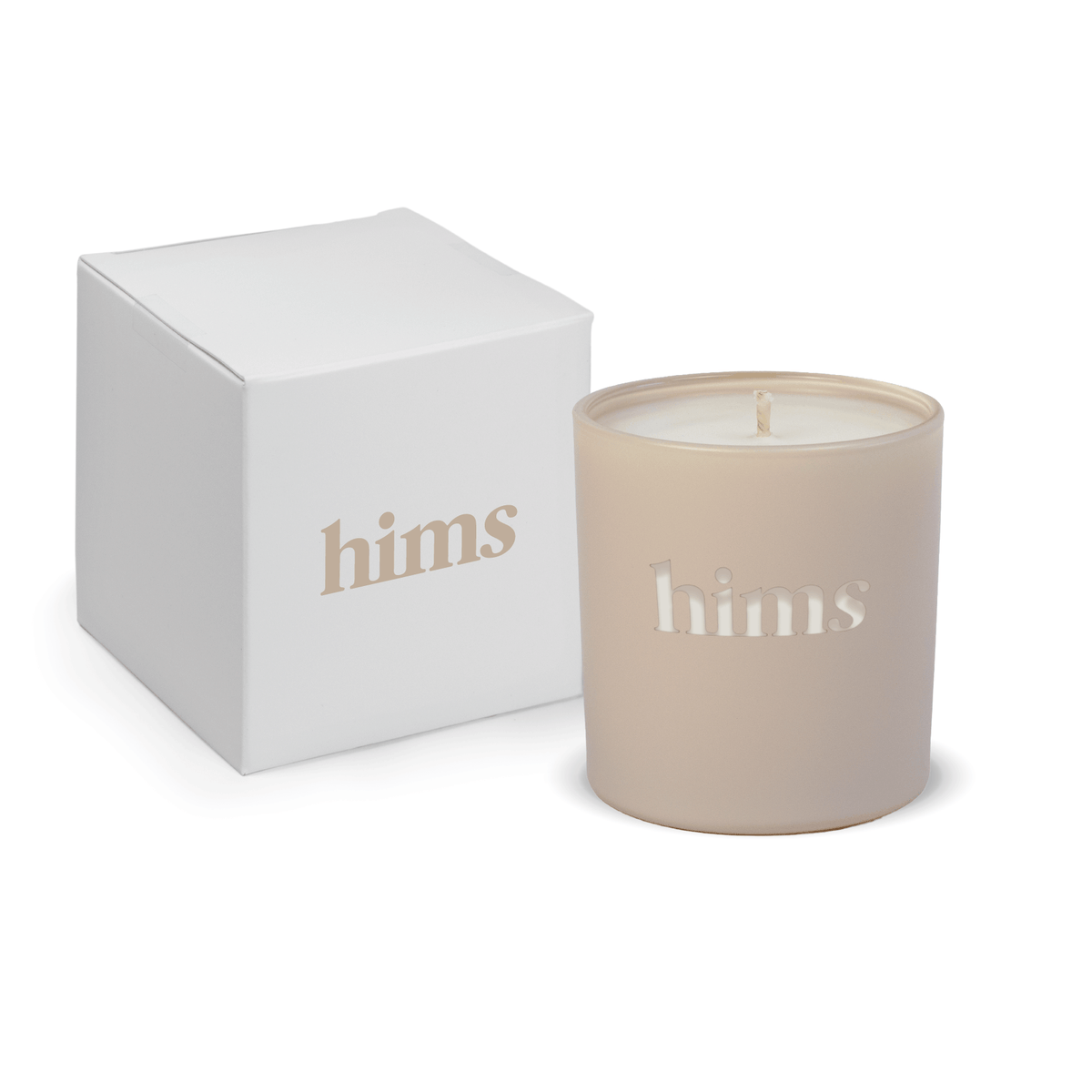 Nude 9 oz. engraved colored glass candle paired with a white gift box.