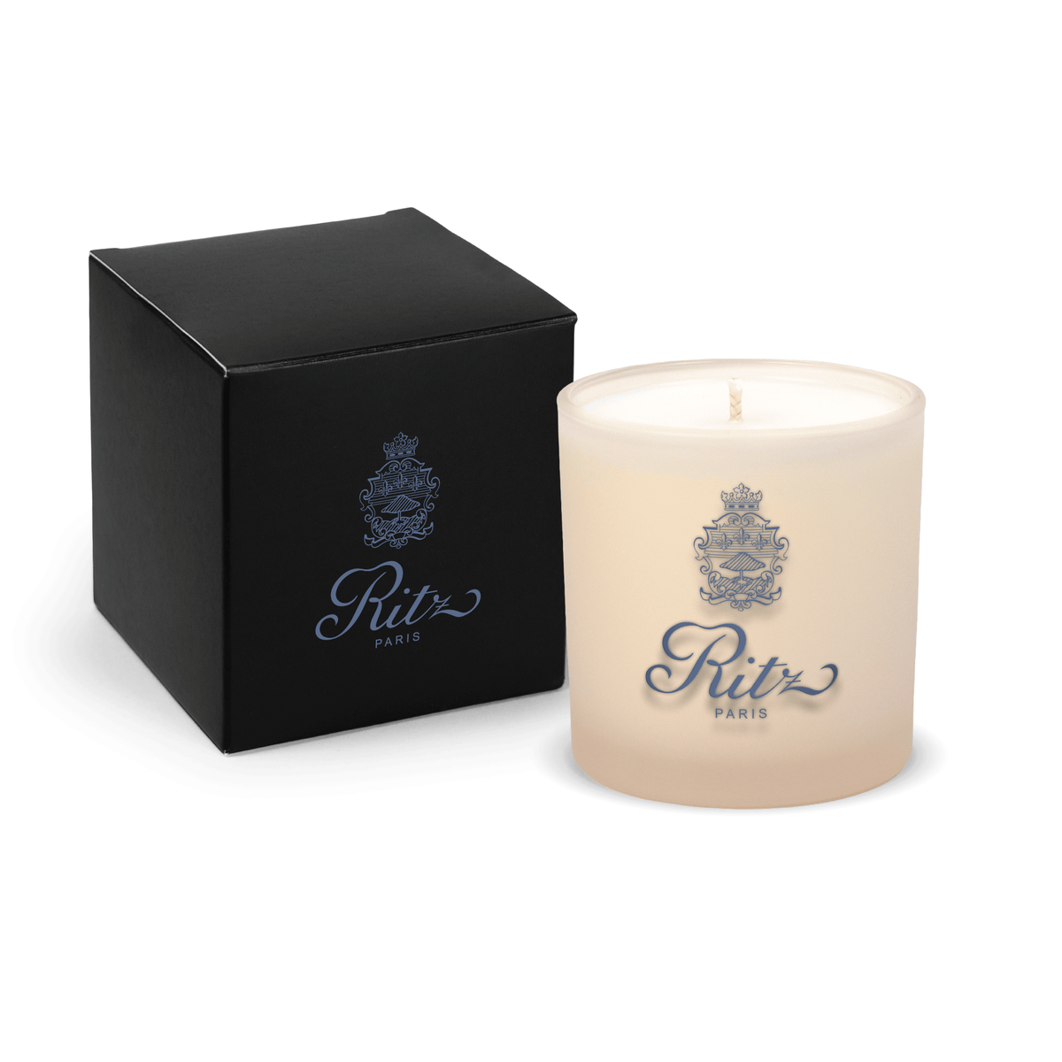 Ivory 9 oz. printed colored glass candle paired with a matte black gift box.