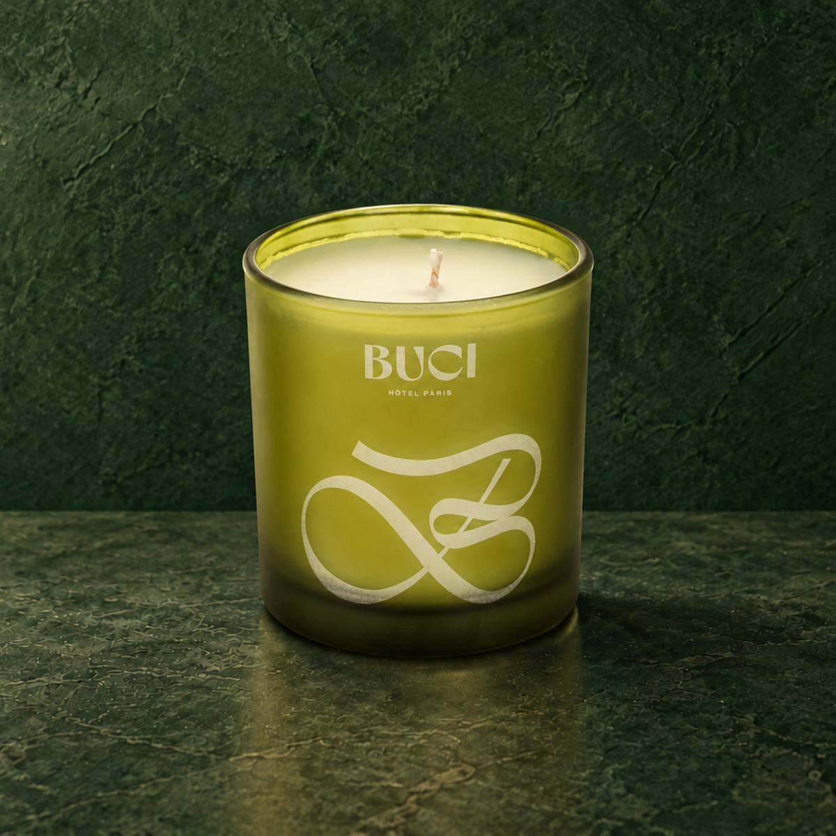 Green 9 oz. Classic Engraved Candle with a custom engraved logo, unlit.