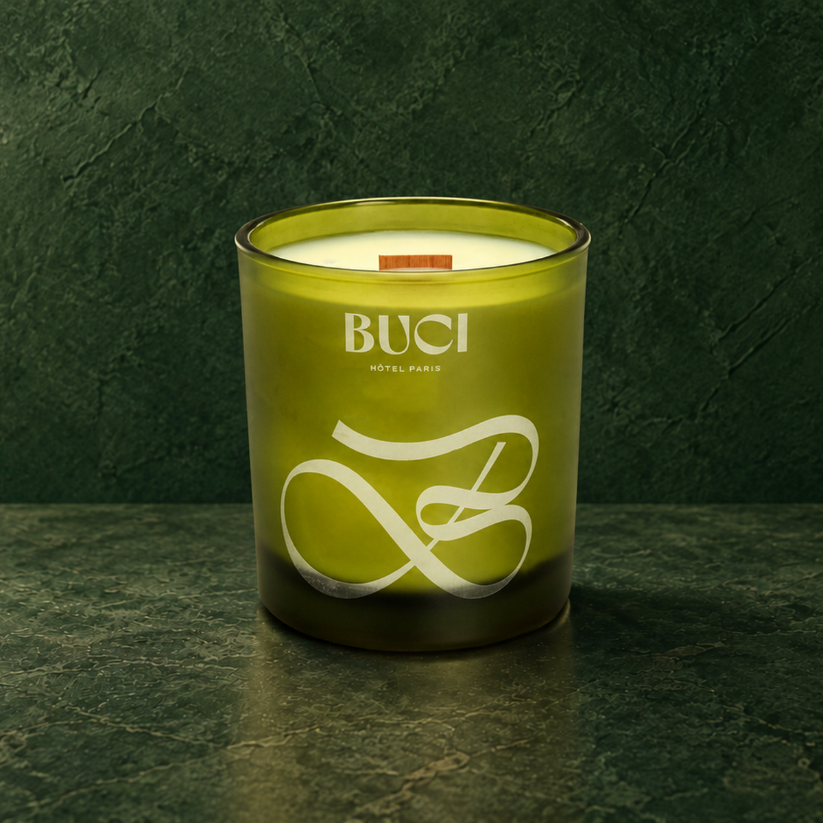 Green 14 oz. Luxury Engraved Candle with a custom engraved logo, unlit.