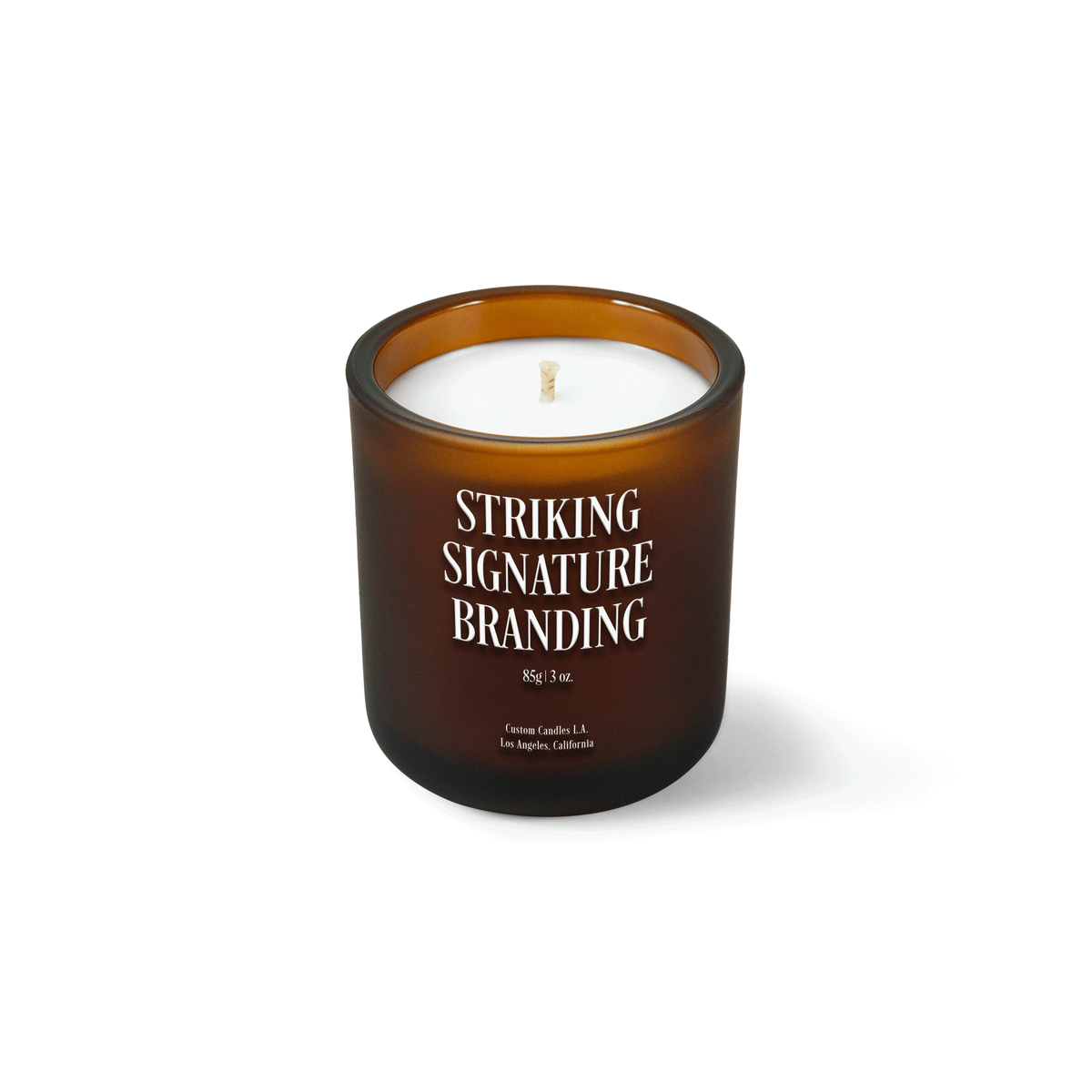 Amber frosted 3 oz Mini Signature candle with a printed custom logo, shown on its own.