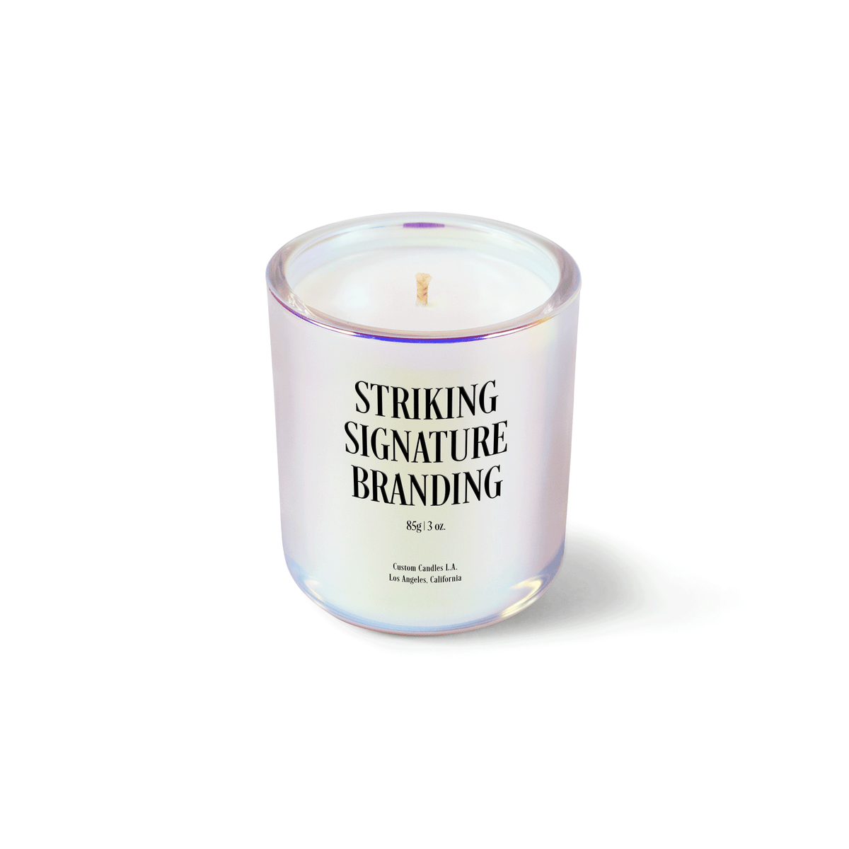 Iridescent pink 3 oz Mini Signature candle with a printed custom logo, shown on its own.