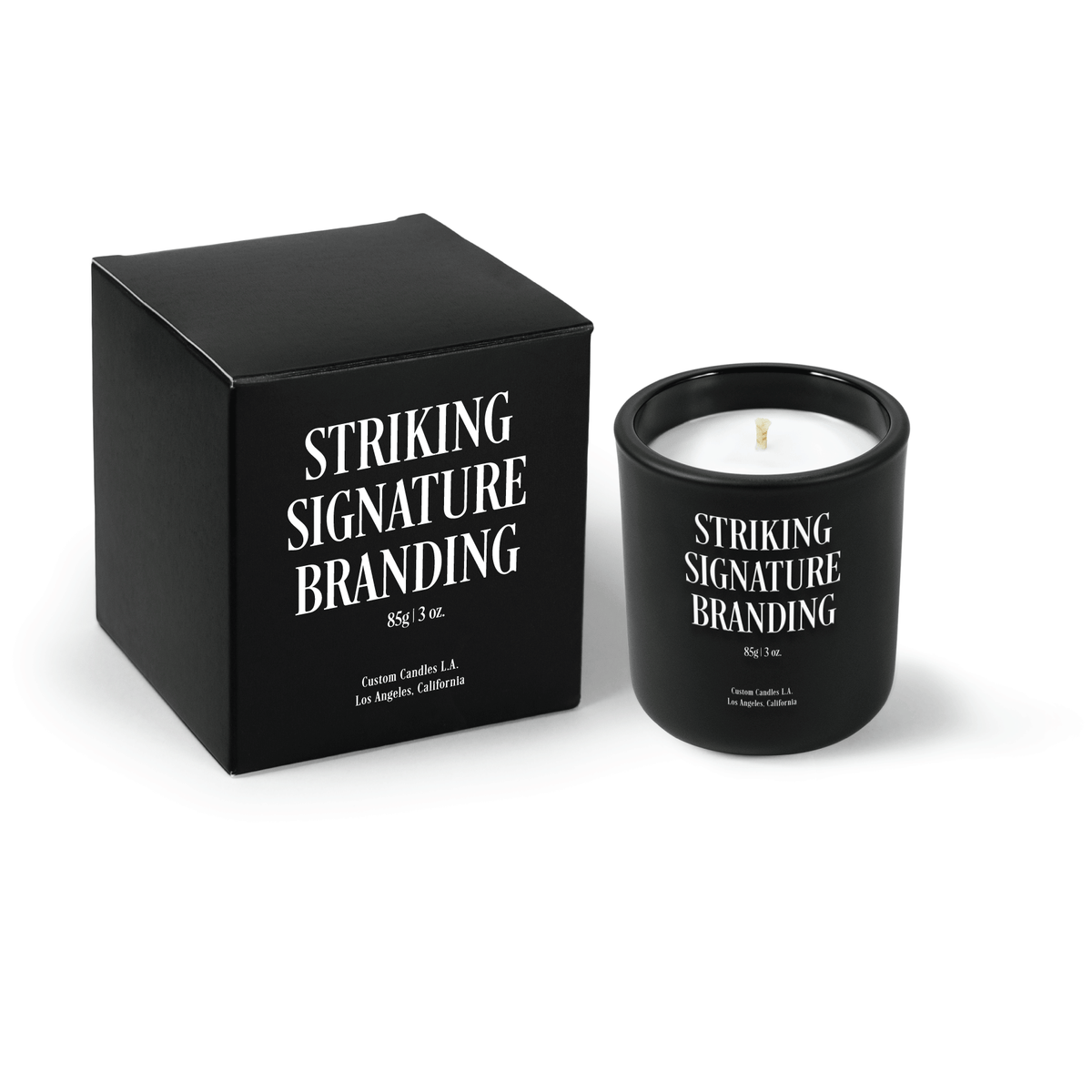 Jet black 3 oz Mini Signature candle, printed, shown beside its gift box.