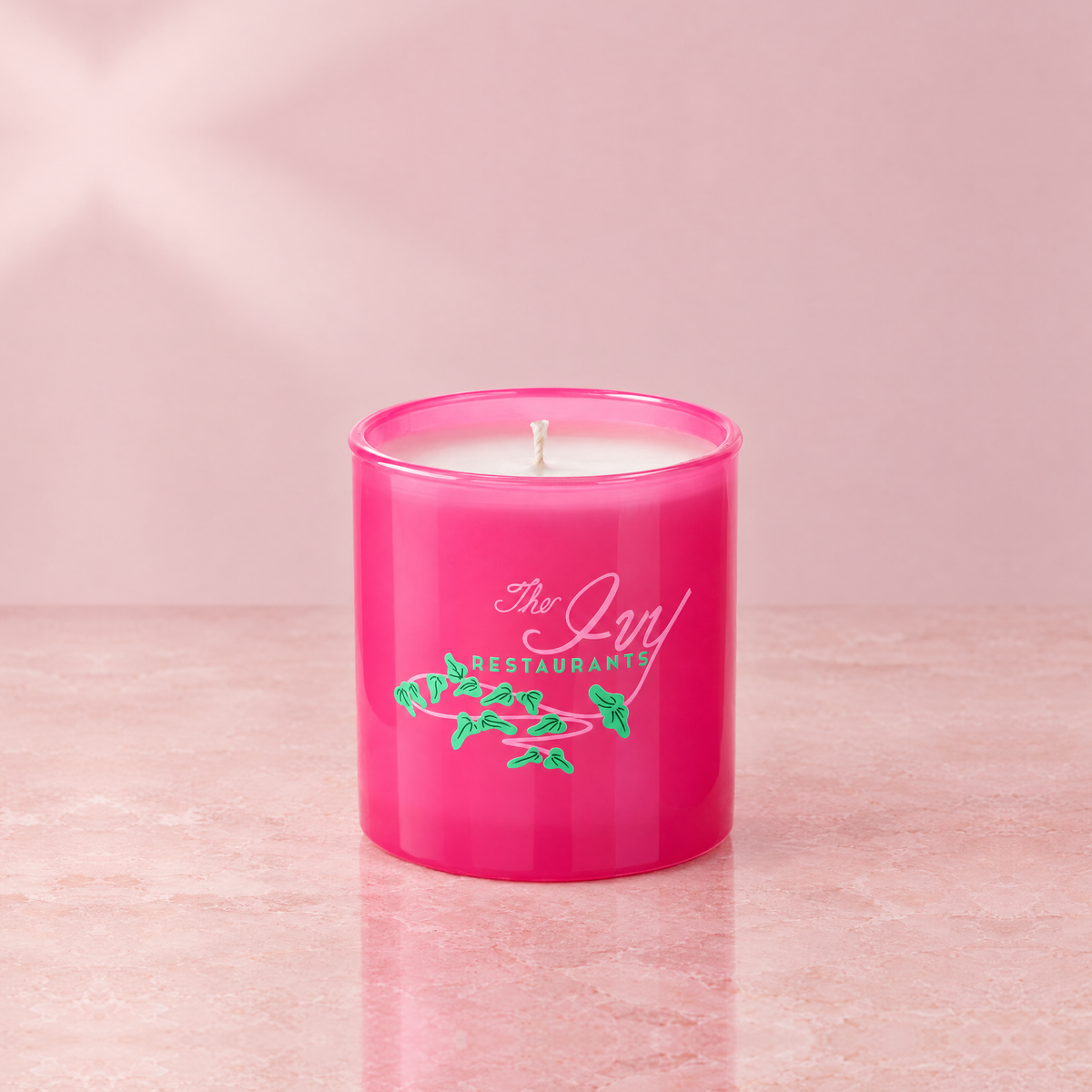 Pink 9 oz. Classic Printed Candle with a custom printed logo, unlit.