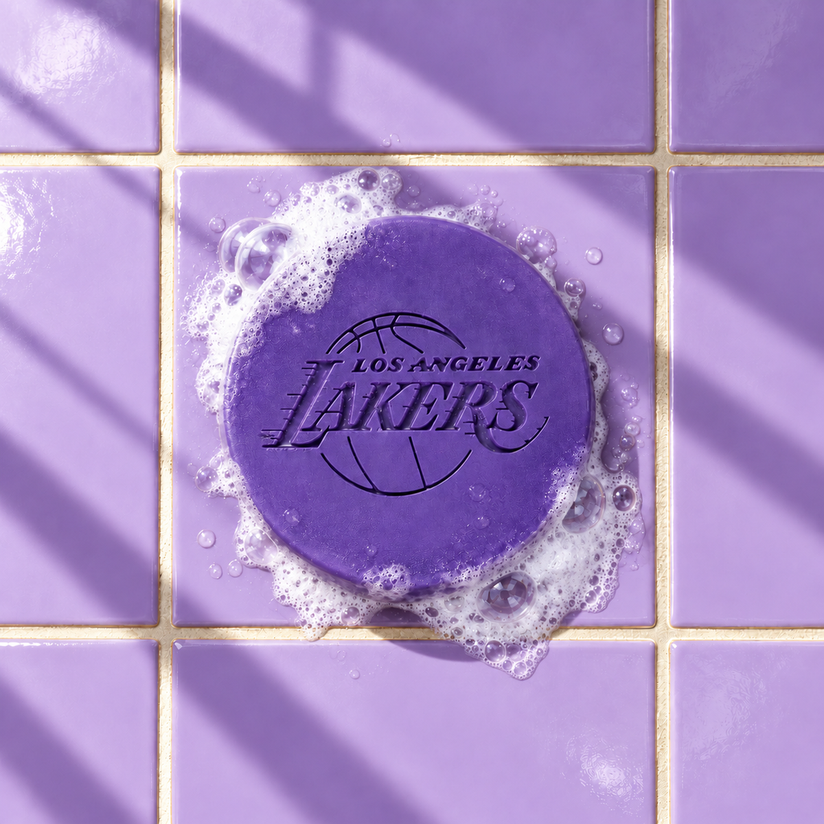 Purple round bar soap laser engraved with a brand logo, 3.6 oz, with soap bubbles