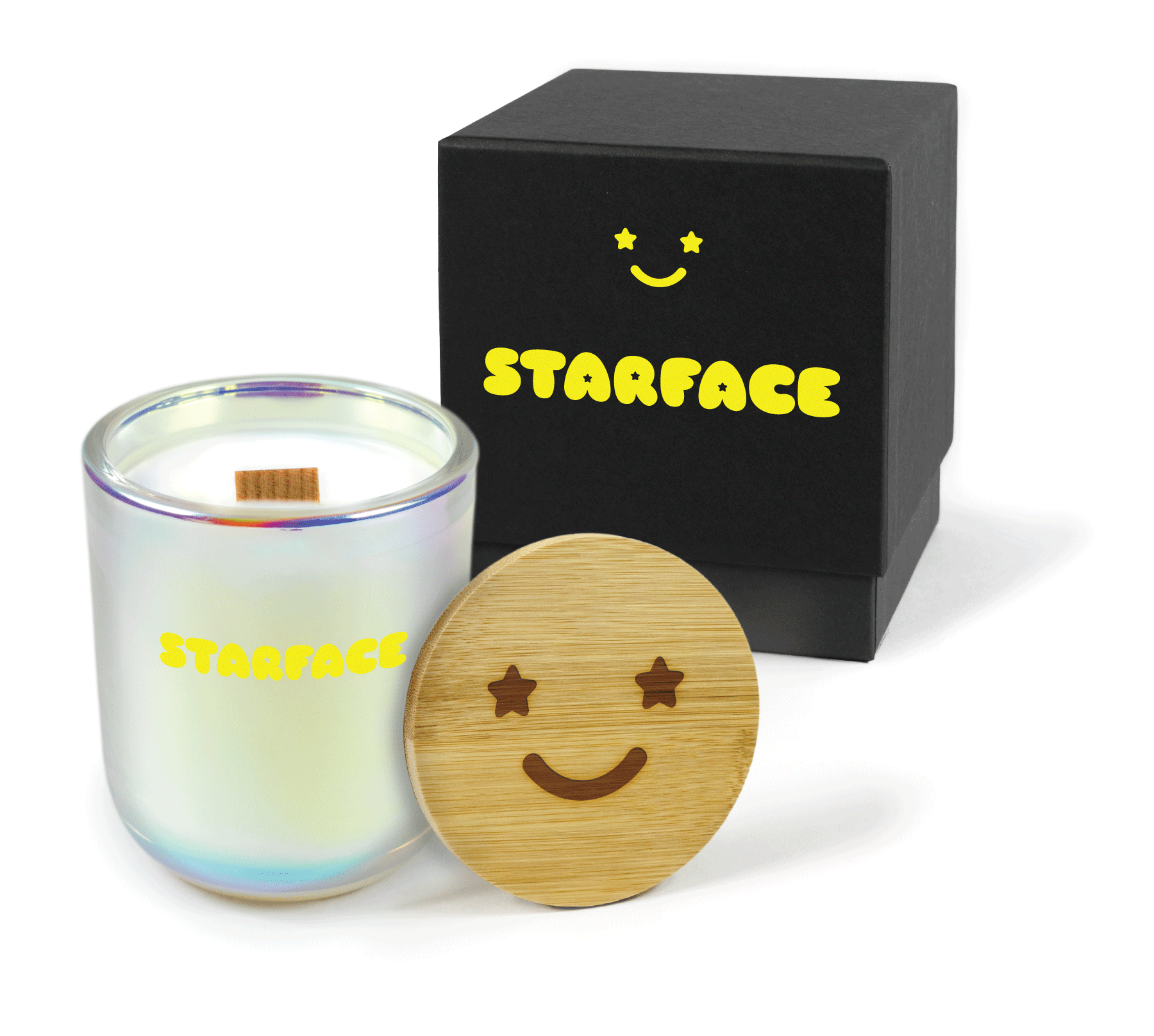 A 12 oz Luxe Custom Candle in the color “Bliss” which is an iridescent pink from Custom Candles LA. The candle features a wood wick and a yellow 4-color imprinted logo for “Starface” on the front of the glass. Leaning against the side of the candle is a bamboo candle lid etched with a happy face that has stars for eyes. In the background, there is a black 2-piece box 4-color printed with a yellow version of the star-eyed happy face and the “Starface” logo.