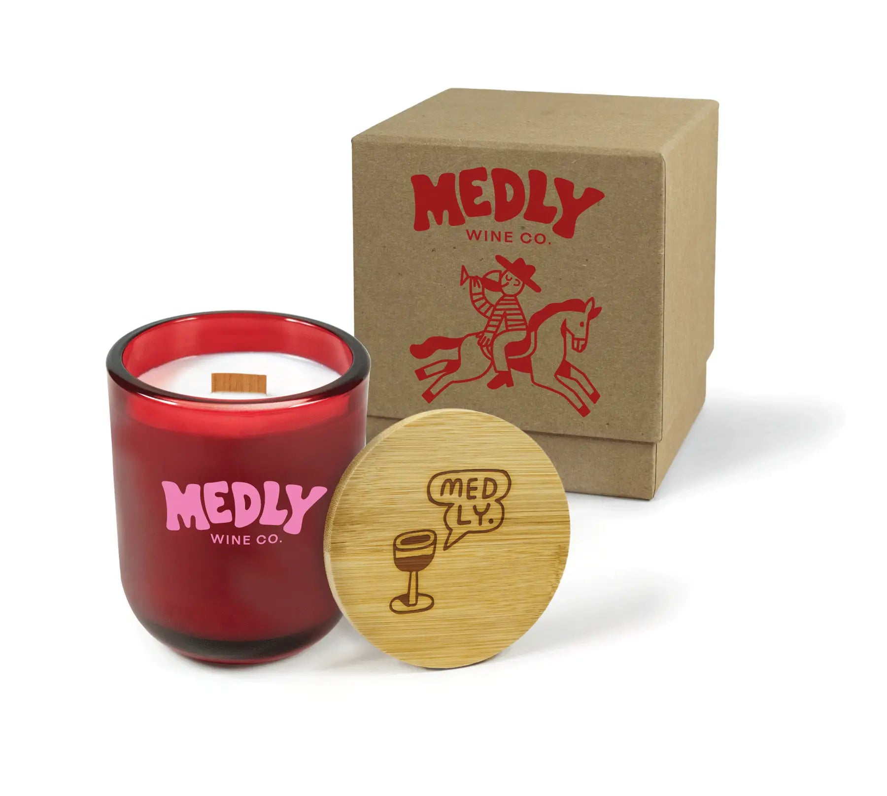 Red candle with branding and a cardboard box featuring the same branding on a white background.