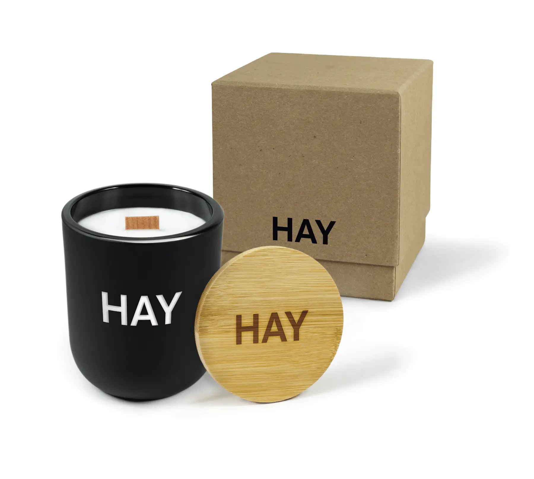 Black candle with wooden lid and branded box on a white background