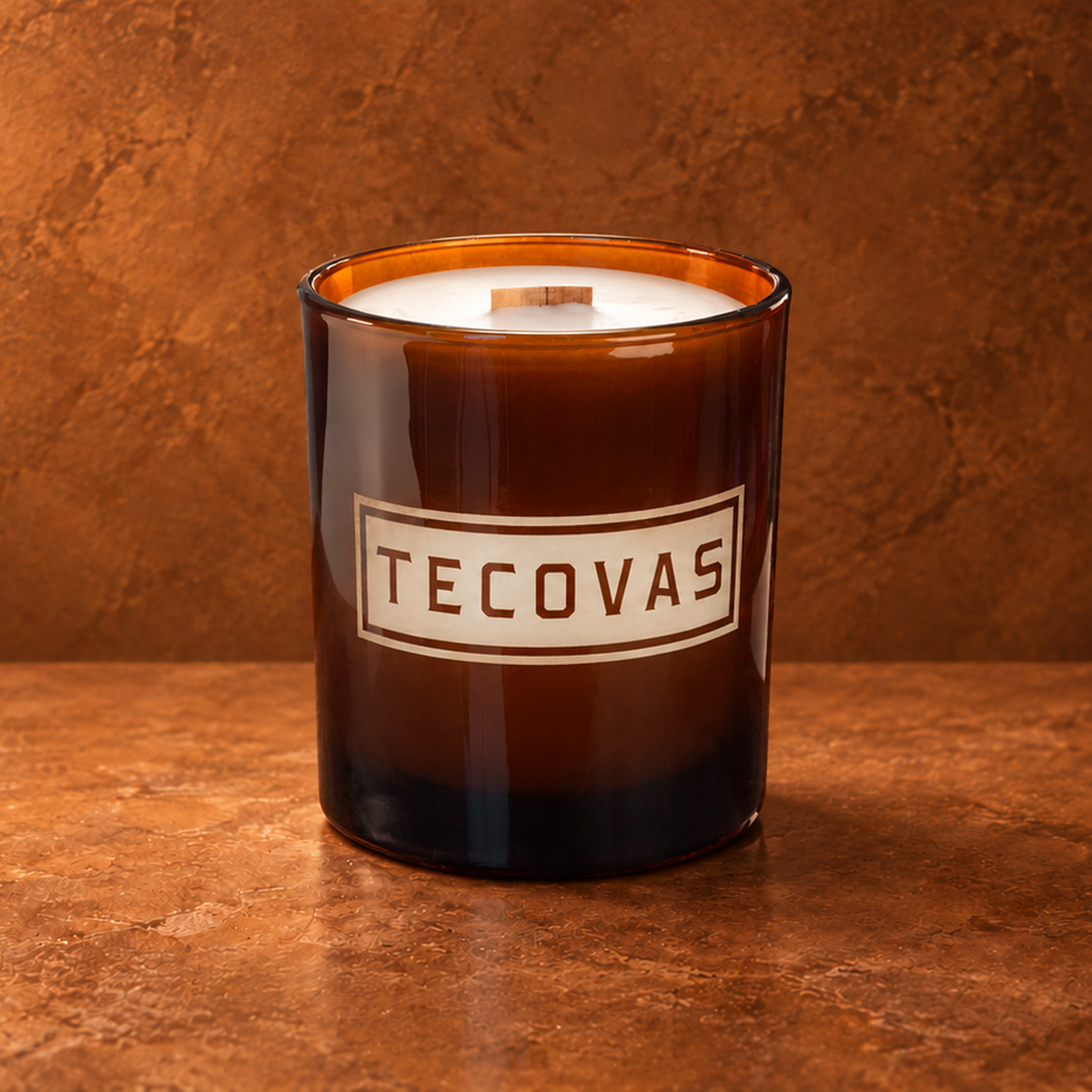 Glossy Amber 14 oz. Luxury Engraved Candle with a custom engraved logo, unlit.