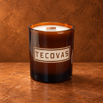 Glossy Amber 14 oz. Luxury Engraved Candle with a custom engraved logo, unlit.