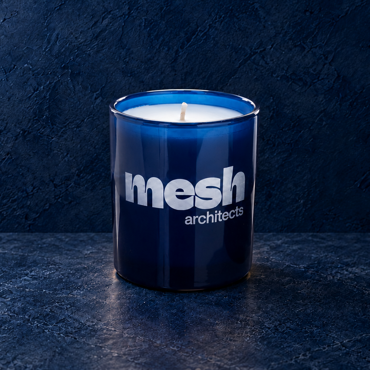 Blue 9 oz. Classic Engraved Candle with a custom engraved logo, unlit.