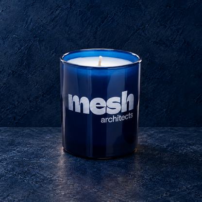 Blue 9 oz. Classic Engraved Candle with a custom engraved logo, unlit.