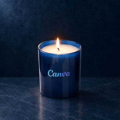 Blue 9 oz. Classic Printed Candle lit with a printed custom logo, shown on a matching blue background.