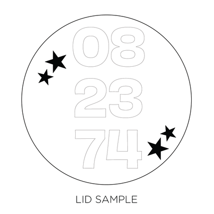 A sample of the wooden lid for the "Happy Birthday with Personalized Age—Premium" Candle by Custom Candles L.A. features the date "08-23-74"stacked in an outline font accompanied with 4 stars around the date.