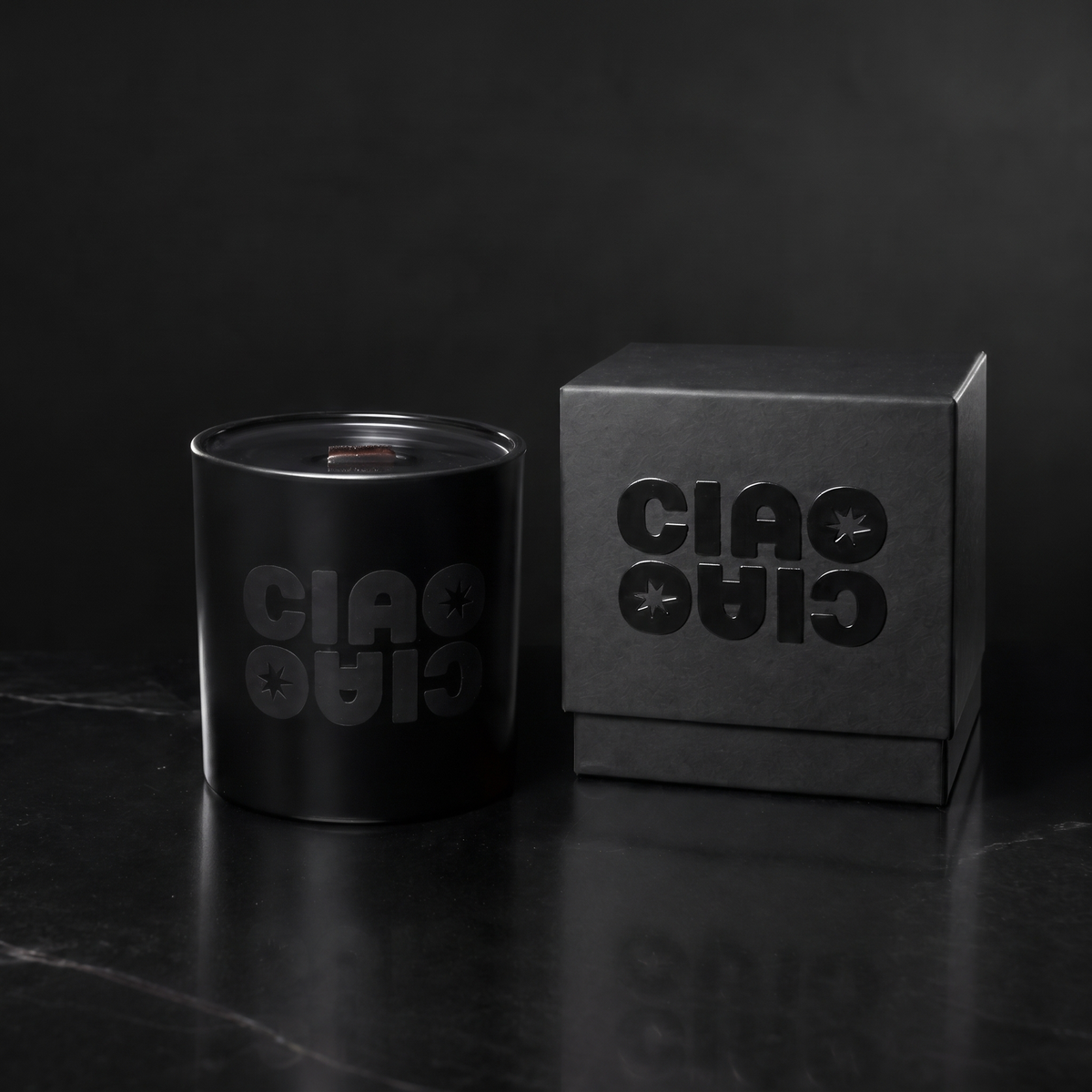 Matte Black 14 oz. Luxury Printed Candle with a tone-on-tone CIAO CIAO logo, shown with its matte black gift box.