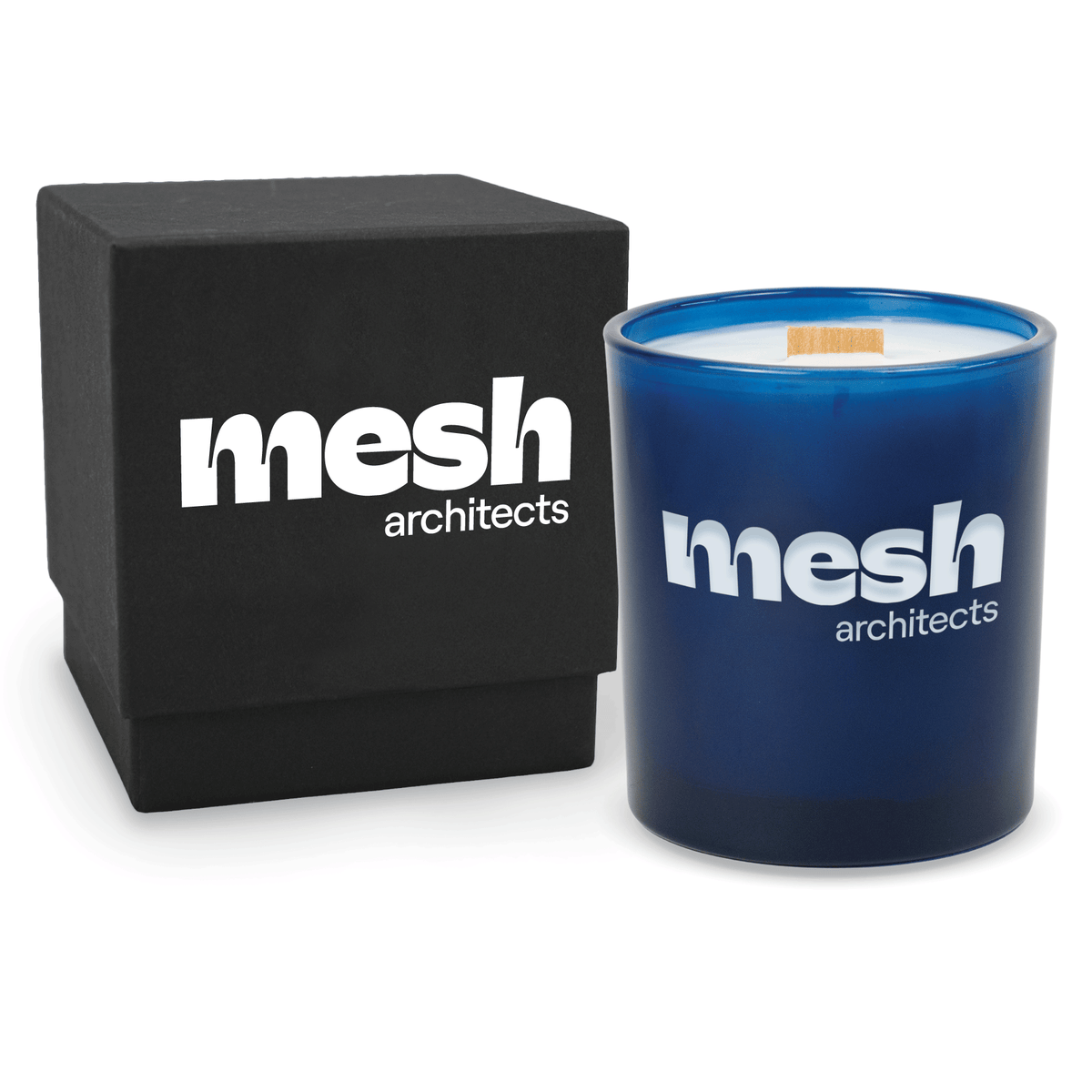Blue 14 oz colored glass engraved logo candle beside a matte black gift box on a white background.