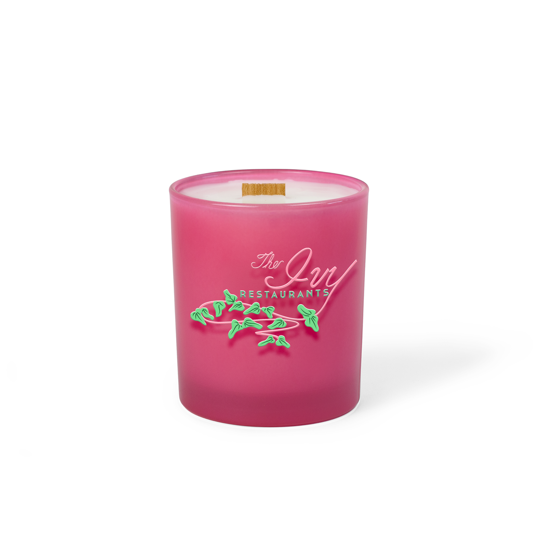 Pink colored-glass 14 oz candle with a printed brand logo, shown on its own.