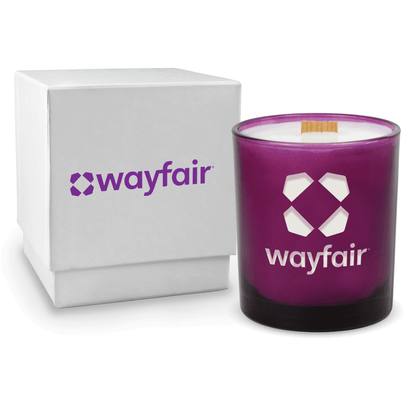 Purple 14 oz colored glass engraved logo candle beside a glossy white gift box on a white background.