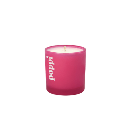 Custom-branded pink 9 oz colored glass candle with a printed logo, single unit