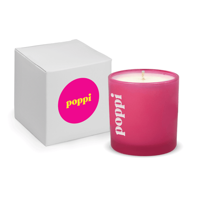 Pink 9 oz. engraved colored glass candle paired with a white gift box.