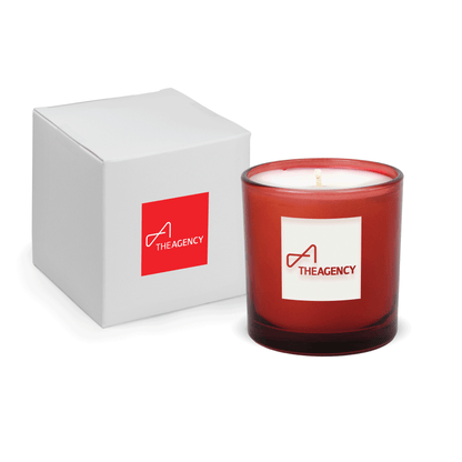 Red 9 oz. engraved colored glass candle paired with a white gift box.