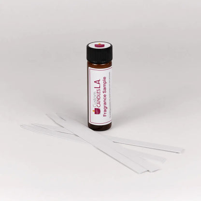 Fragrance sample bottle with a label on a white background