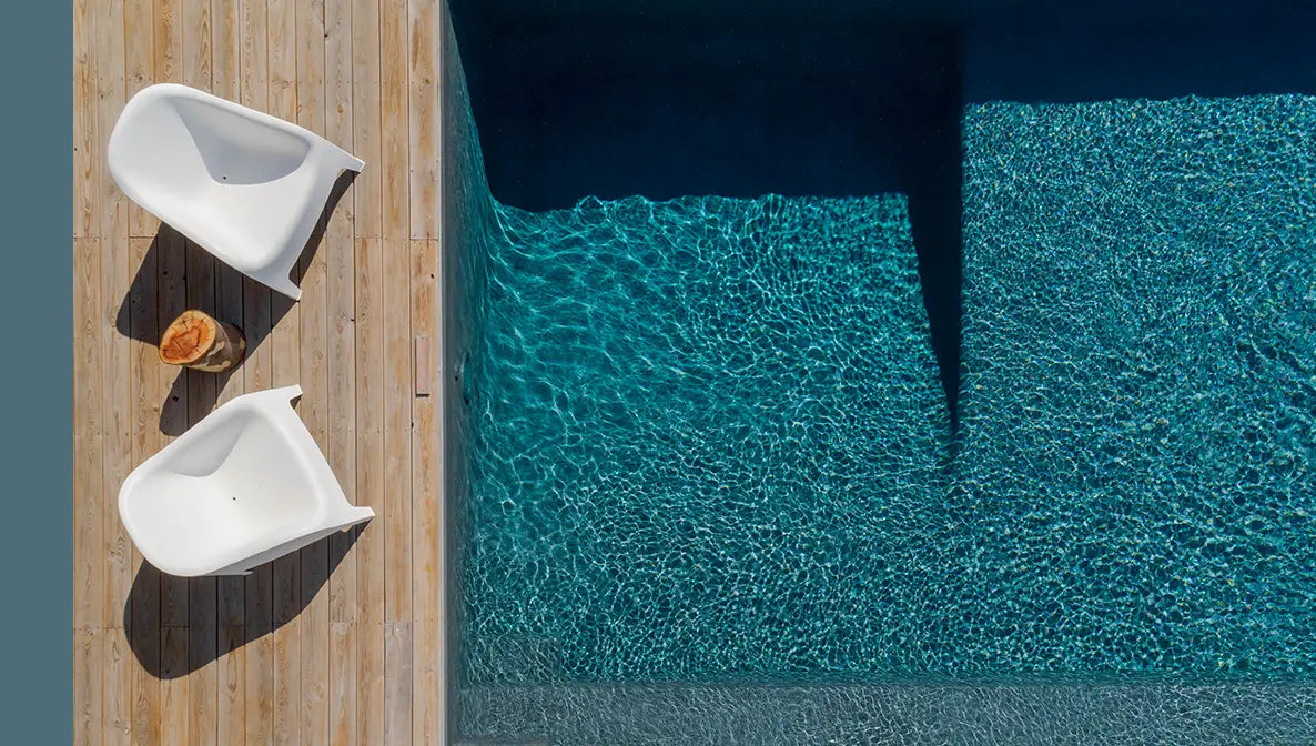 Poolside

A hedonistic blend of teakwood and coconut, opening into a luxe tropical escape of overwater villas, sun-warmed skin, and island cocktails.