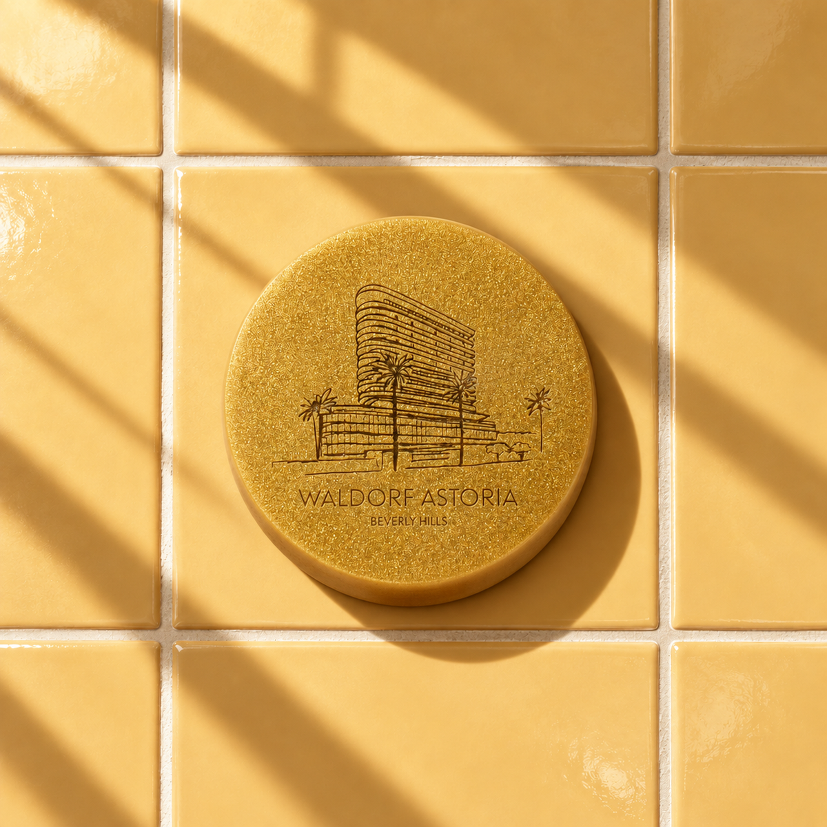 Gold round bar soap laser engraved with a brand logo, 3.6 oz