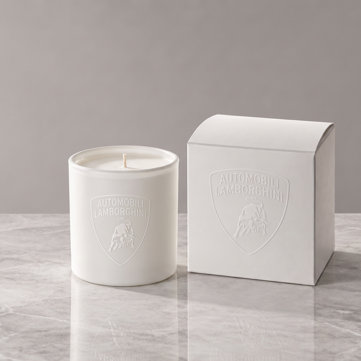 Matte white 9 oz. classic candle with a tone-on-tone logo