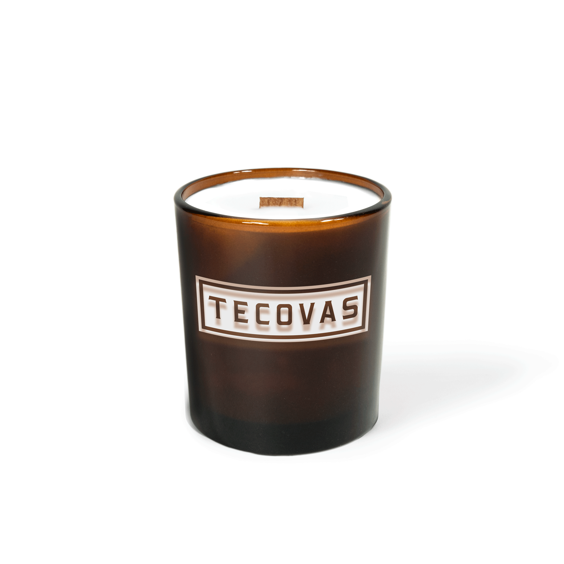 Glossy amber 14 oz luxury candle with an engraved brand logo, shown on its own.