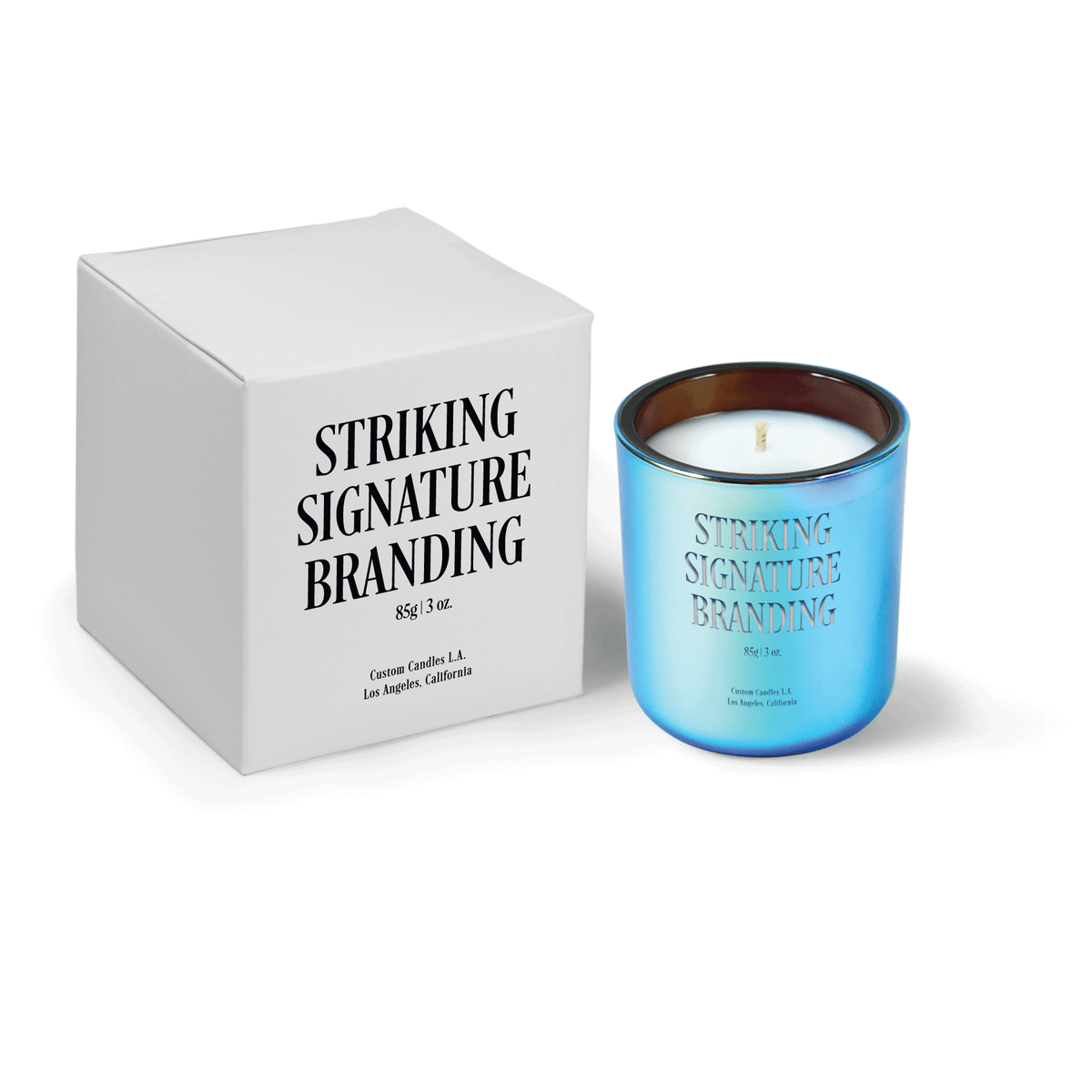 Chromatic blue 3 oz Mini Signature candle, engraved, shown beside its gift box.