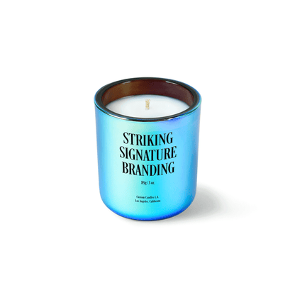 Chromatic blue 3 oz Mini Signature candle with a printed custom logo, shown on its own.