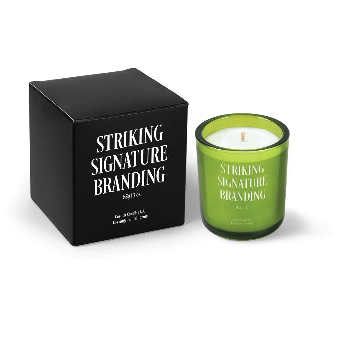 Verdant green 3 oz Mini Signature candle, engraved, shown beside its gift box.