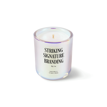 Iridescent pink 3 oz Mini Signature candle with a printed custom logo, shown on its own.