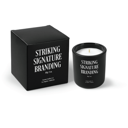 Jet black 3 oz Mini Signature candle, printed, shown beside its gift box.