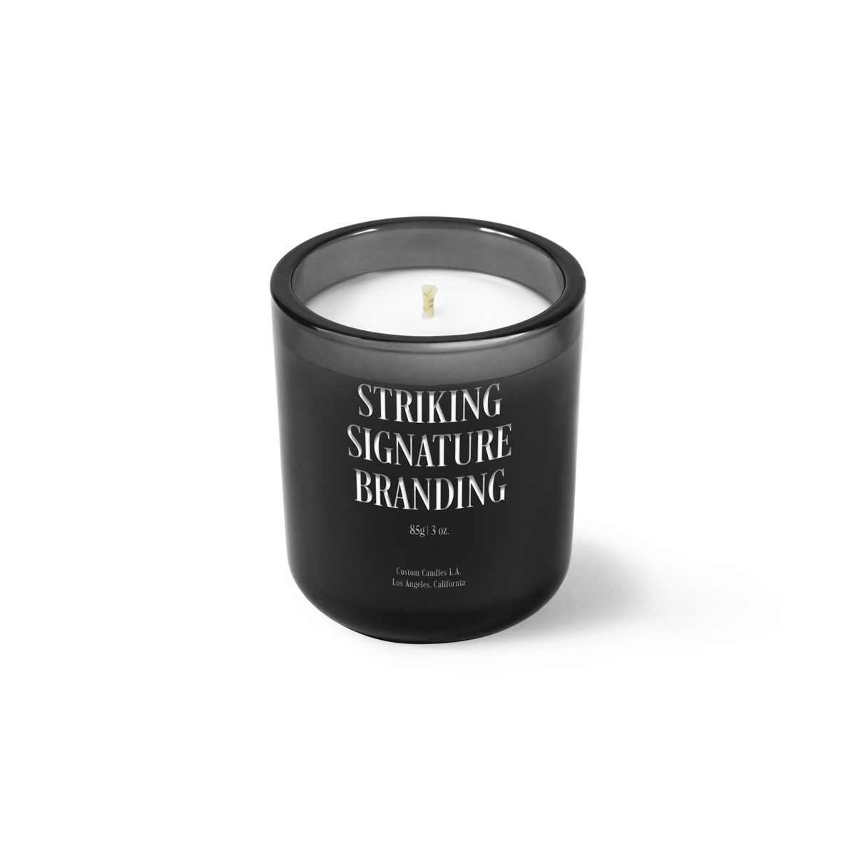 Charcoal gray 3 oz Mini Signature candle with a laser-engraved custom logo, shown on its own.