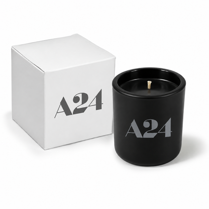 Jet black 3 oz Mini Signature candle poured with black wax, shown beside its gift box.