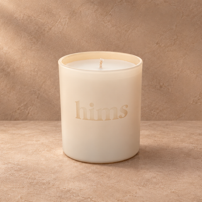 Nude 9 oz. Classic Engraved Candle with a custom engraved logo, unlit.