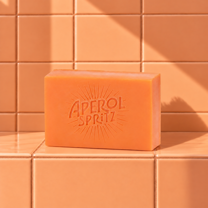 Orange rectangle bar soap laser engraved with a brand logo, 3.25 oz