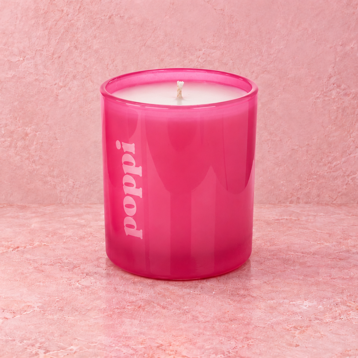 Pink 9 oz. Classic Engraved Candle with a custom engraved logo, unlit.