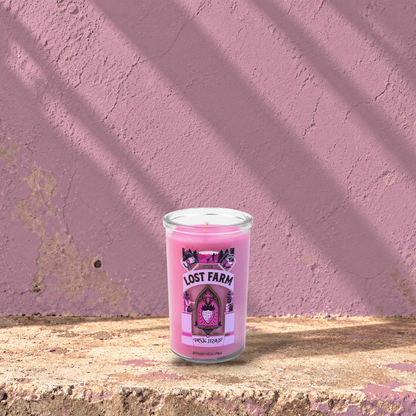 Pink 5 oz custom mini prayer candle printed with the Kiva Lost Farm logo on a pink background, unlit