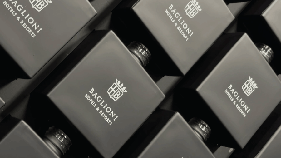 close up shot of black diffuser bottles with their elegant white branding at a shot from a very sharp camera angle