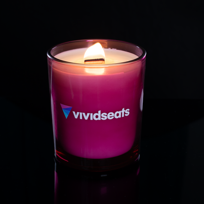 Purple 14 oz. Luxury Printed Candle lit, shown on a black background.