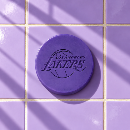 Purple round bar soap laser engraved with a brand logo, 3.6 oz