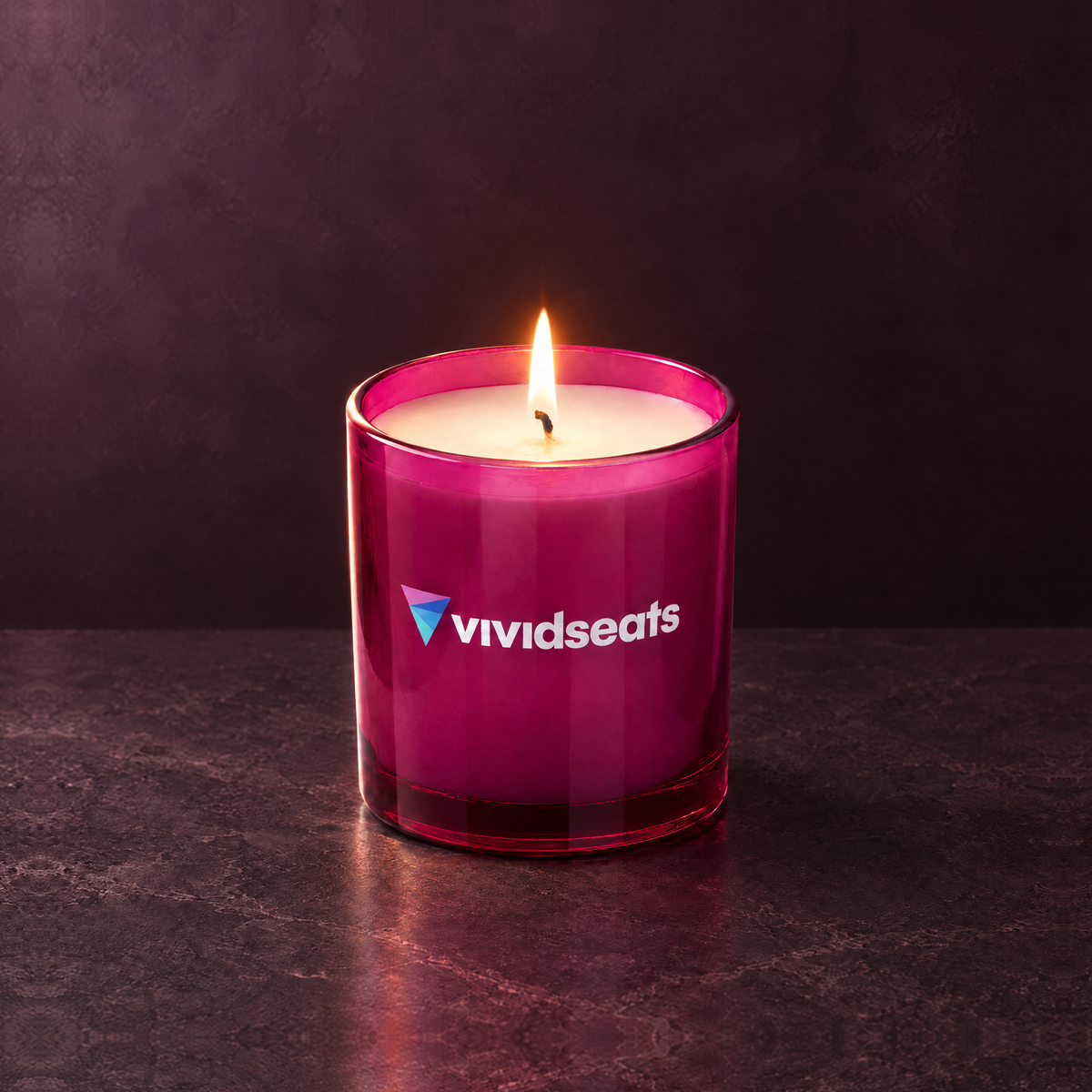 Purple 9 oz. Classic Printed Candle lit with a printed custom logo, shown on a matching purple background.