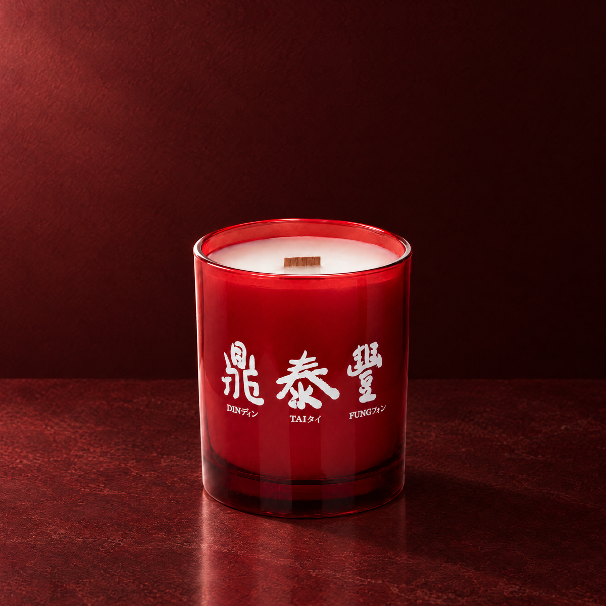 Red 14 oz. Luxury Printed Candle with a custom printed logo, unlit.
