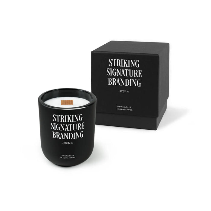 Black Sample Signature candle with 'Striking Signature Branding' branding next to a black box on a white background