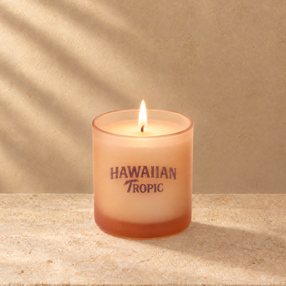 Sand 9 oz. Classic Printed Candle lit with a printed custom logo, shown on a matching sand background.