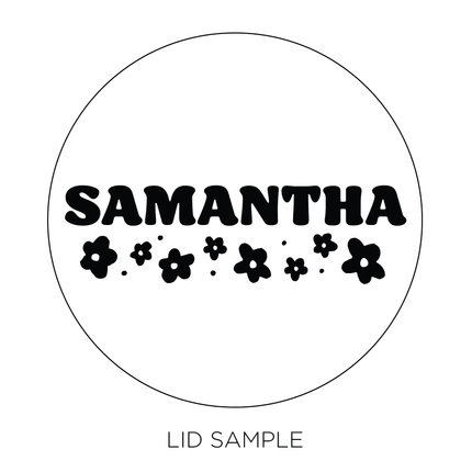 A sample of the wooden lid for the "Will you be my bridesmaid? Candle" by Custom Candles L.A. features the the name "Samantha"  along with large and small flowers, and dots below the name—making it the perfect wedding party gift.